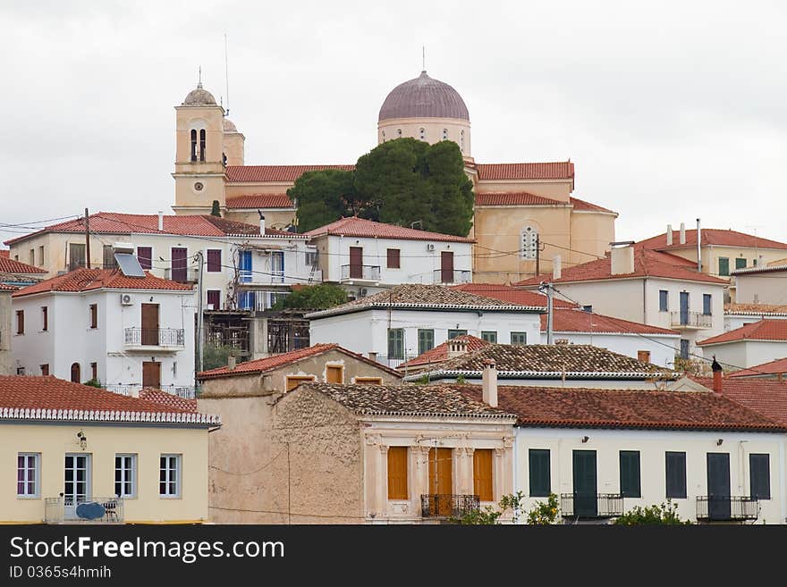 The high section of Galaxidi town (Greece), with the church in the center of it. The high section of Galaxidi town (Greece), with the church in the center of it