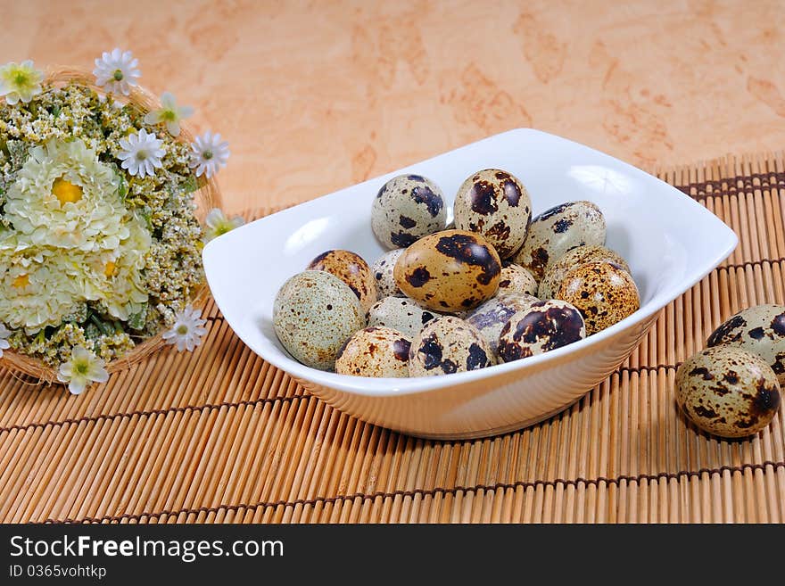 Quail eggs with Easter decorations.