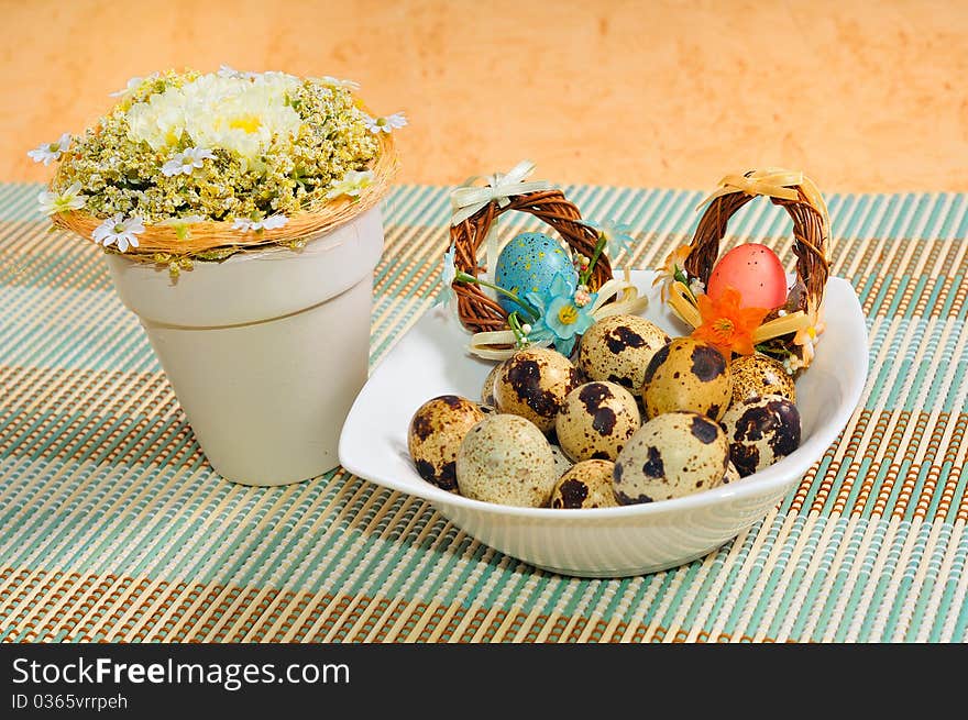 Quail eggs with Easter decorations.