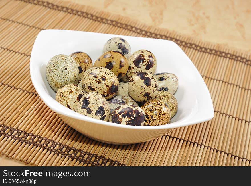 Quail eggs with Easter decorations.