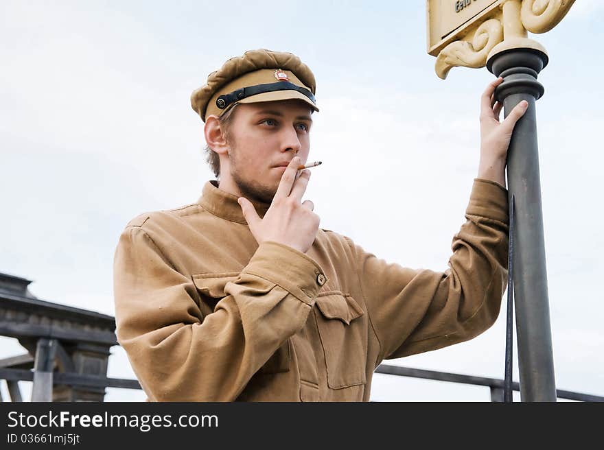 Retro Style Picture With Smoking Soldier.