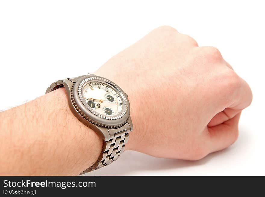 Wristwatch on the hand on a white background