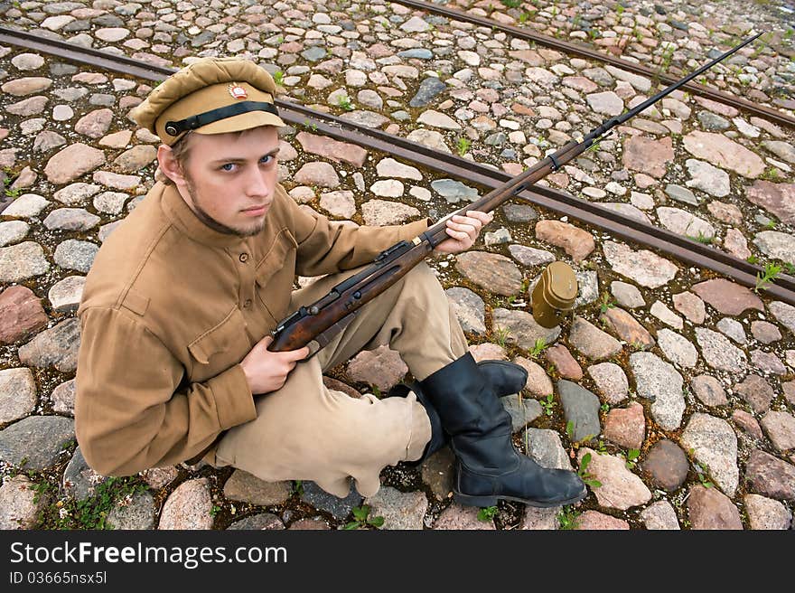 Soldier with boiler and gun in retro style picture