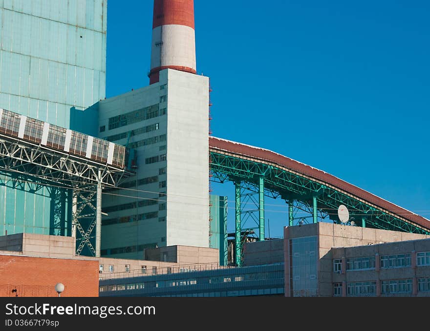 The image of power station against a winter landscape. The image of power station against a winter landscape