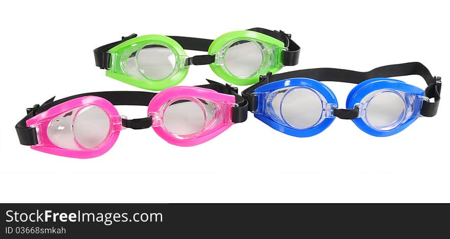 Three color swimming glasses over white background. Three color swimming glasses over white background.