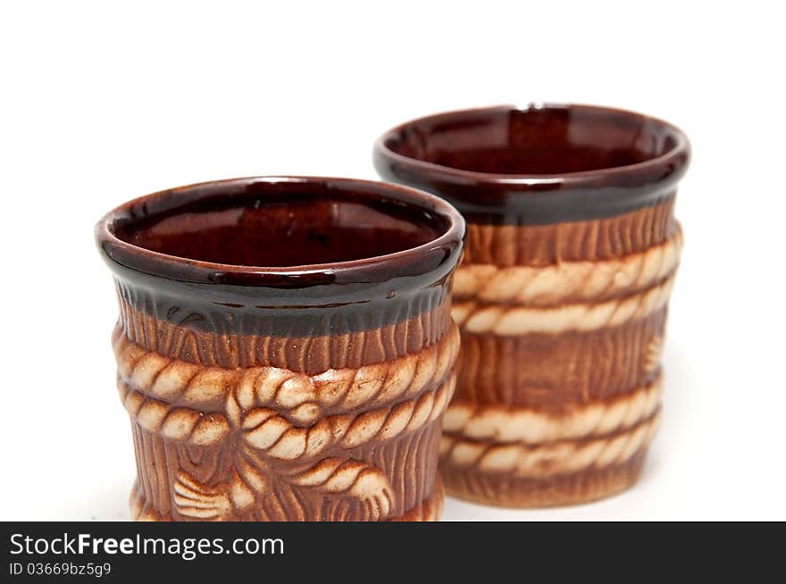 2 brown decorative cups