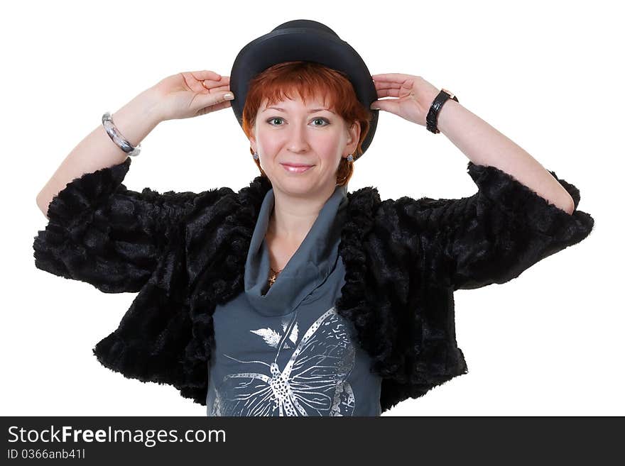 Girl in the bowler hat and a fur coat