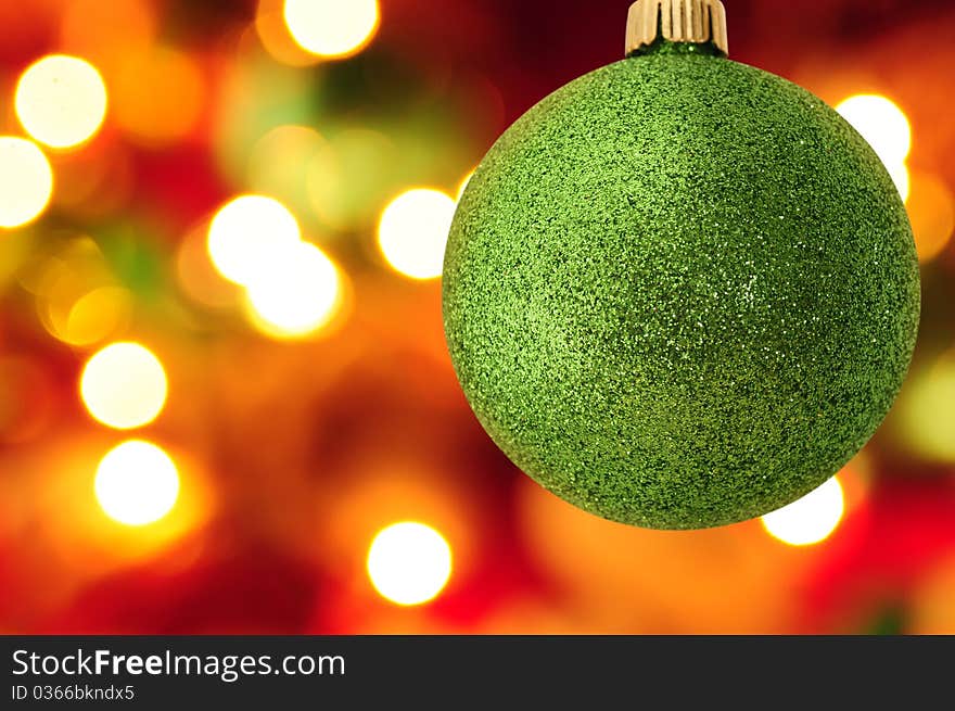 Christmas ball with blurred light in the background. Christmas ball with blurred light in the background.