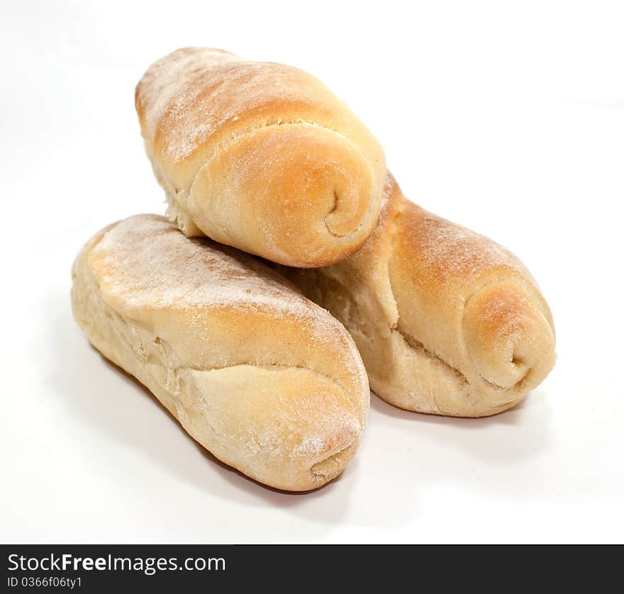 Tree yellow breads isolated on white background