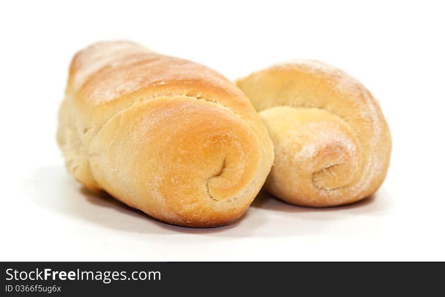 Two yellow breads isolated on white background