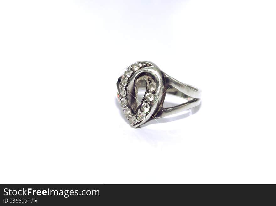 A silver ring with zirconium decoration. A silver ring with zirconium decoration