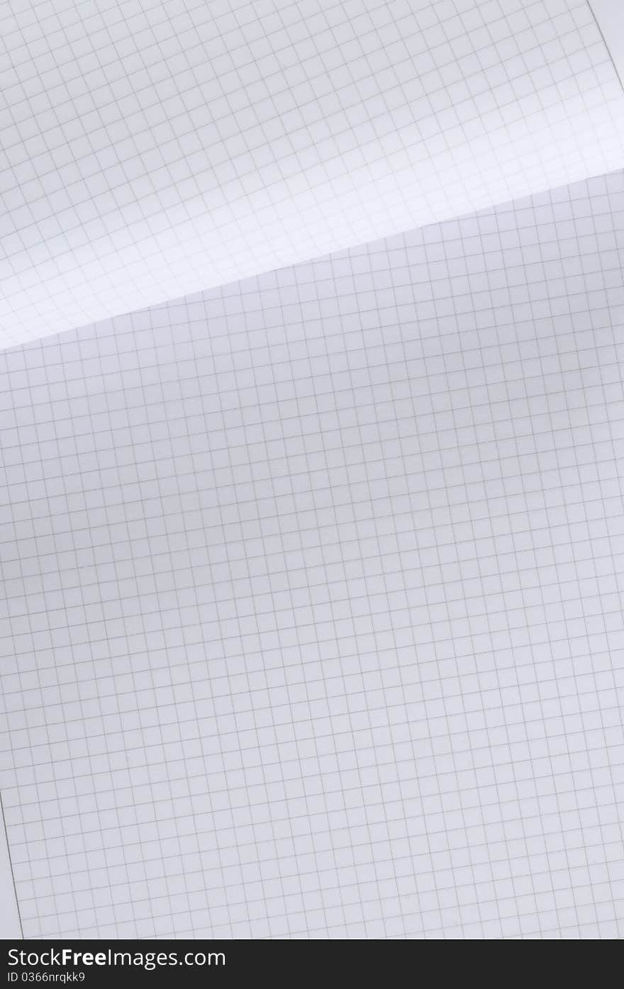 White notebook with square lines. White notebook with square lines.