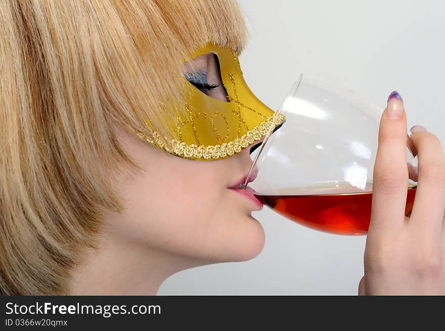 Young beautiful woman drinking wine. Young beautiful woman drinking wine