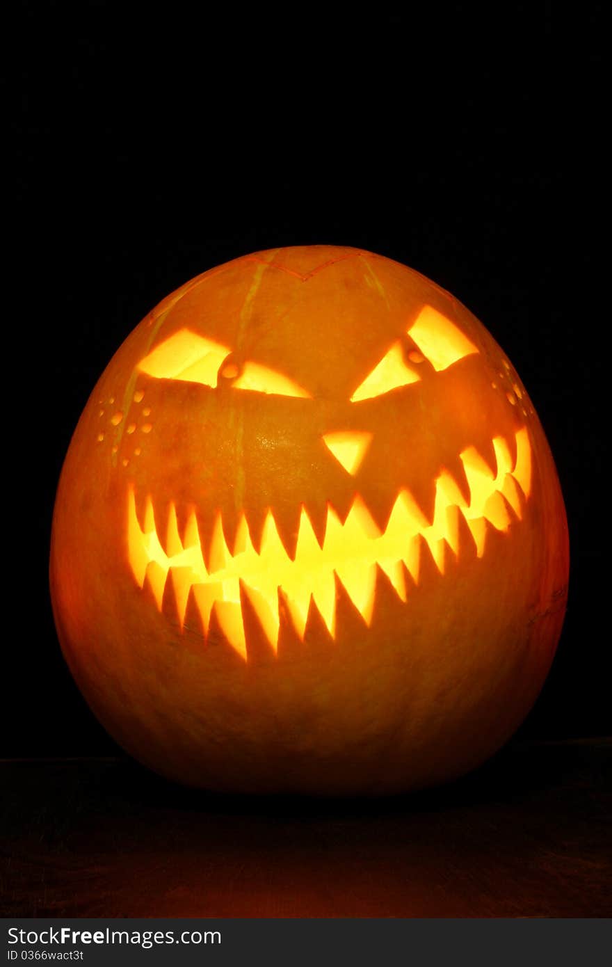 A halloween pumpkin with lighting. A halloween pumpkin with lighting