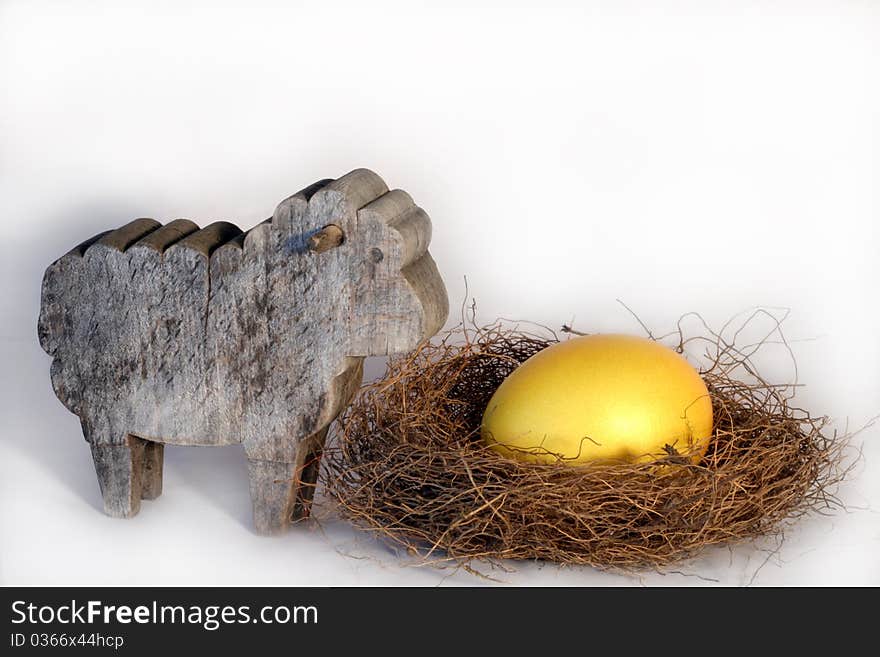 Easter eggs arranged with some decoration on a neutral background.