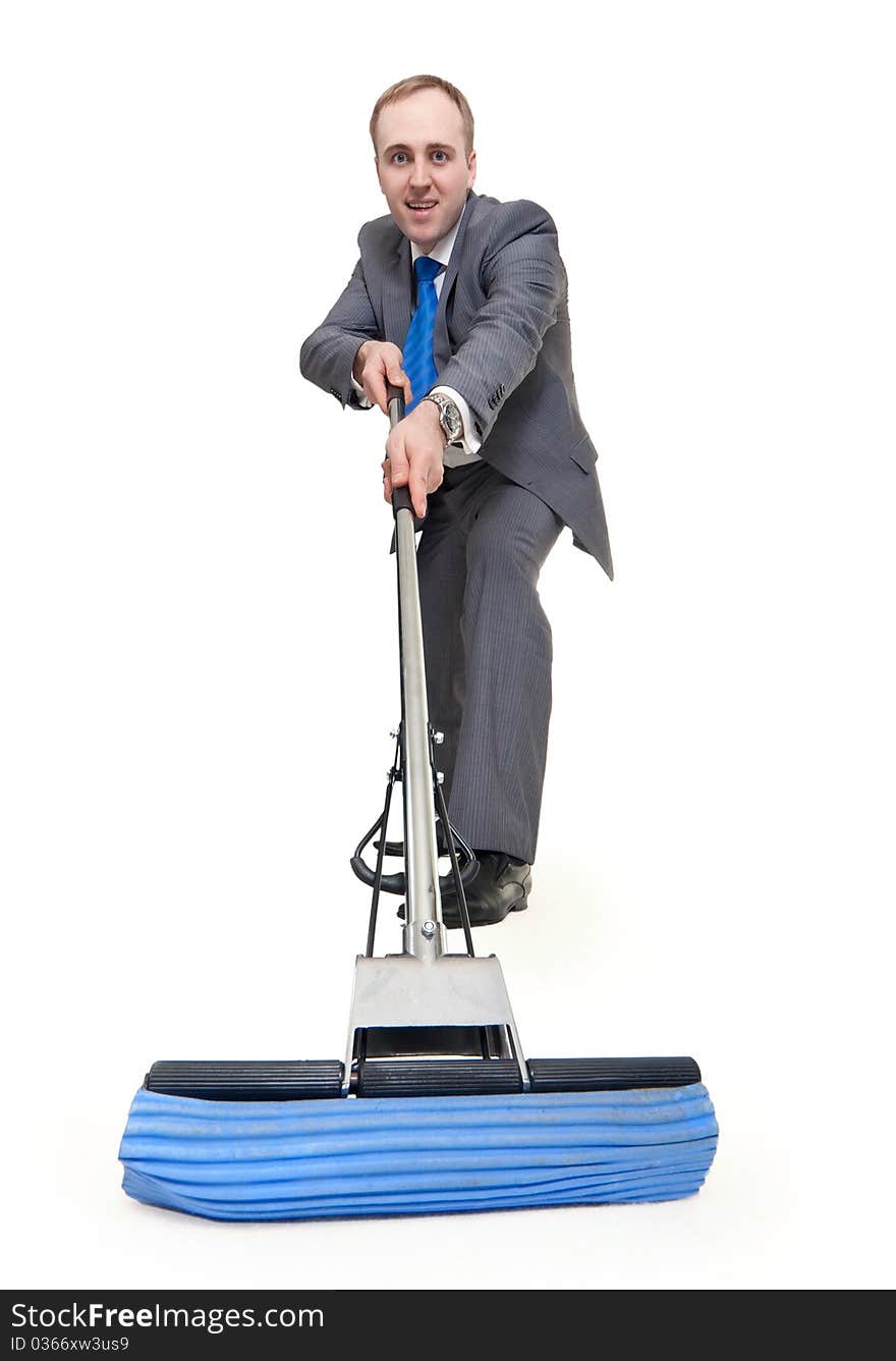 Businessman with a mop washes the floor on a white background