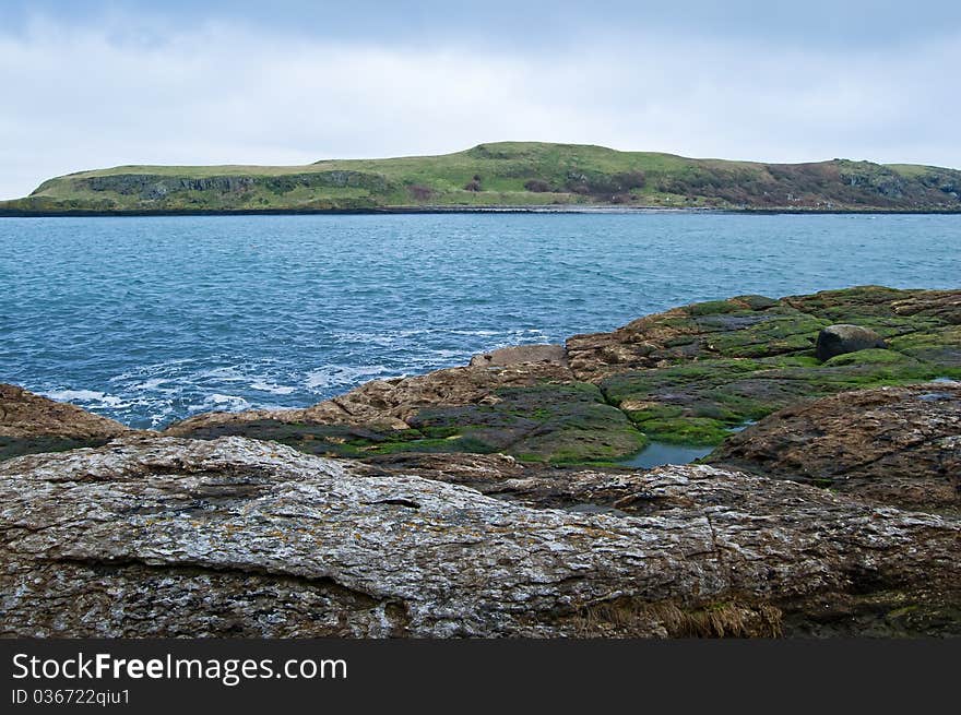 A view of Portmuck Island, Portmuck, Islandmagee, County Antrim, Ireland.