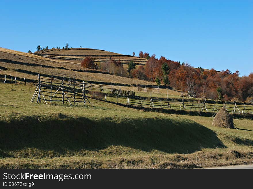 Wood fences by the hills, in the autumn. Wood fences by the hills, in the autumn