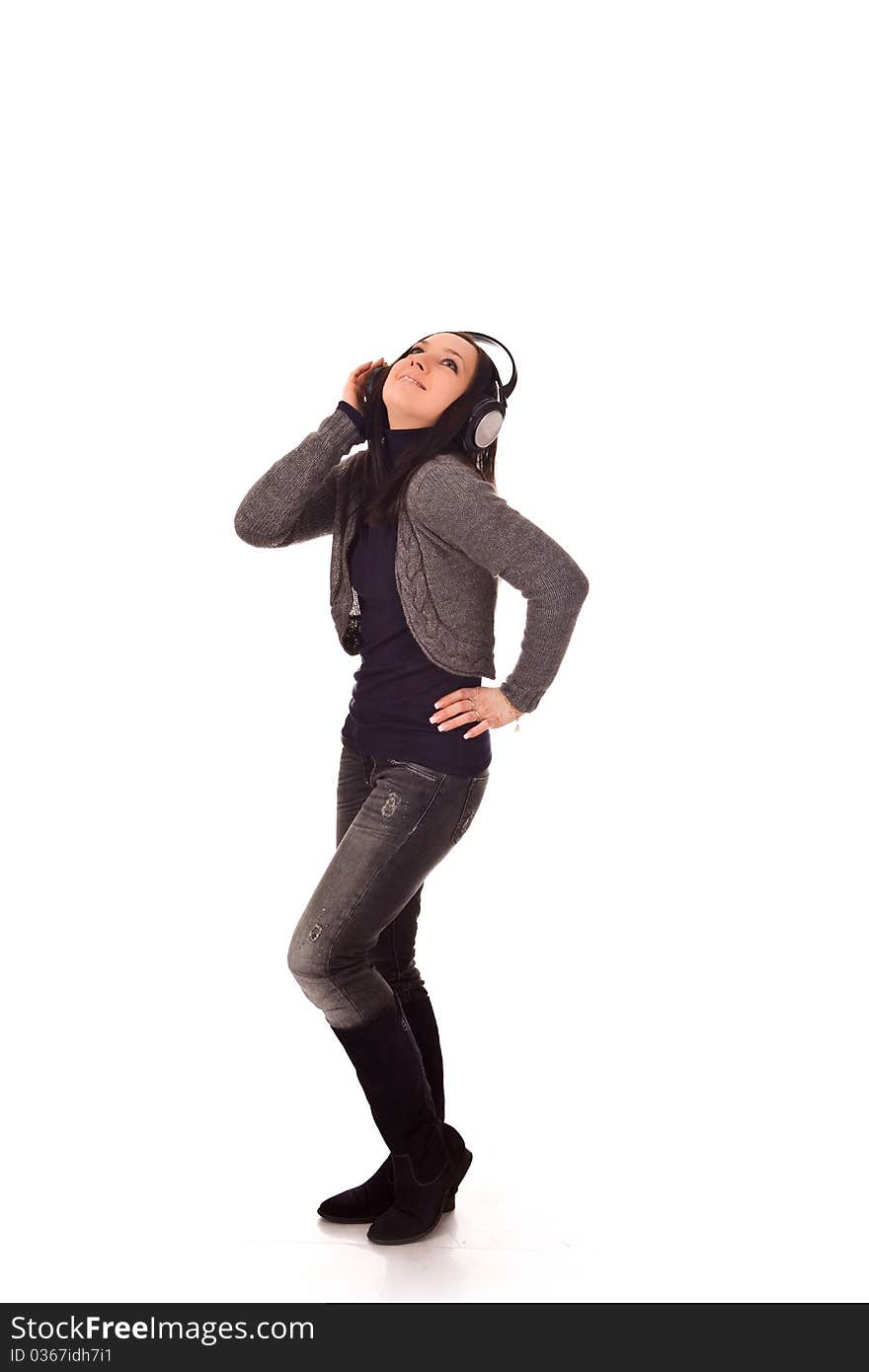 Photo of dancing woman with headphones on isolated background