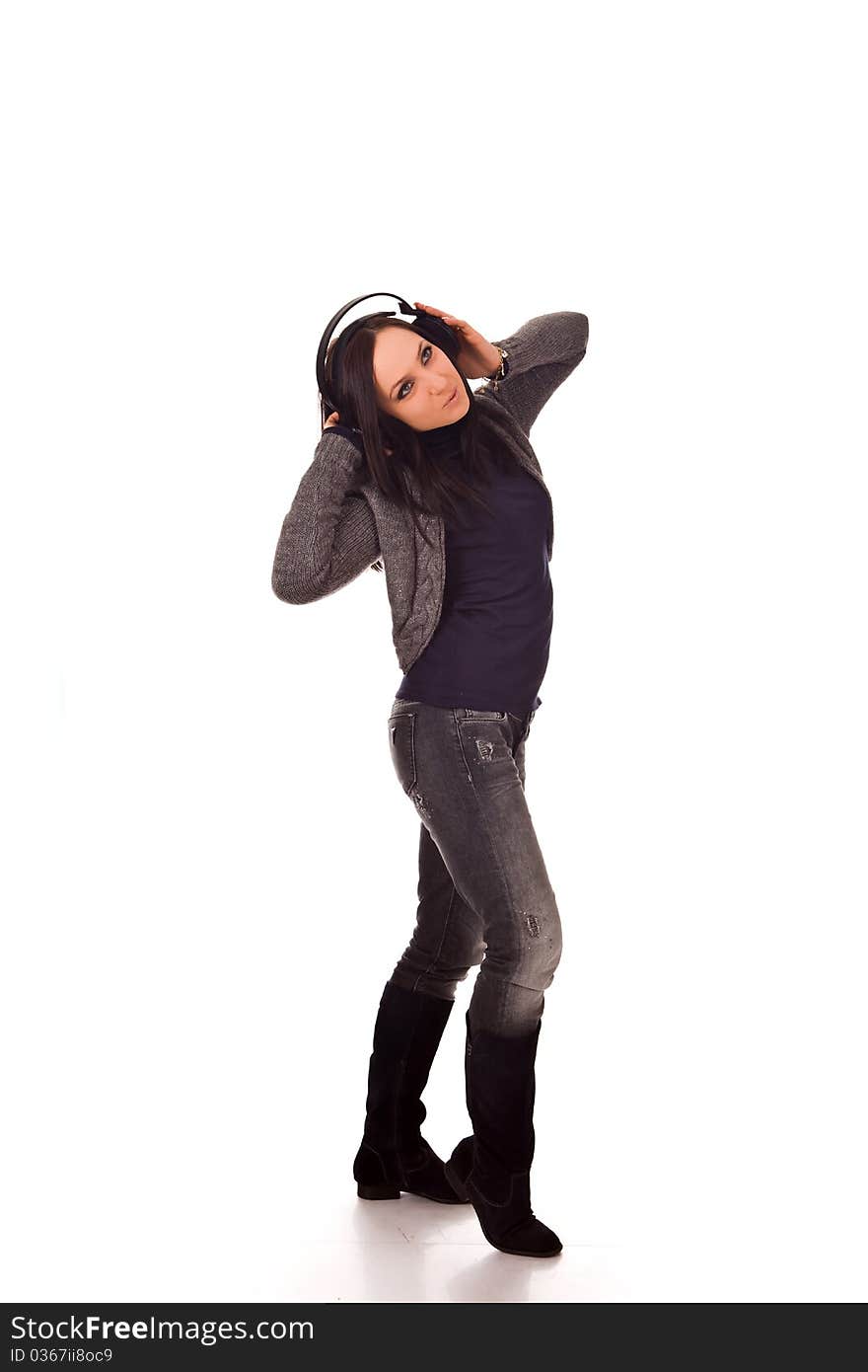 Photo of dancing woman with headphones on isolated background