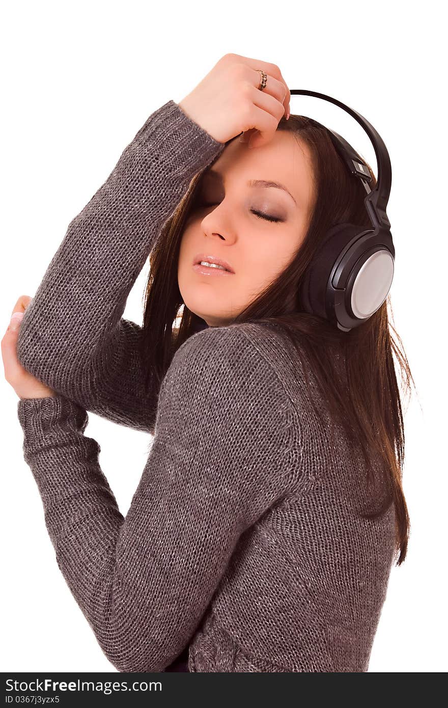 Photo of dancing woman with headphones on isolated background