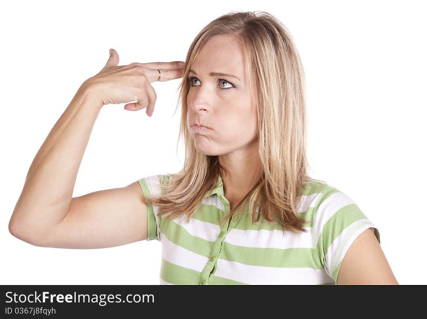 Woman in green and white finger to head