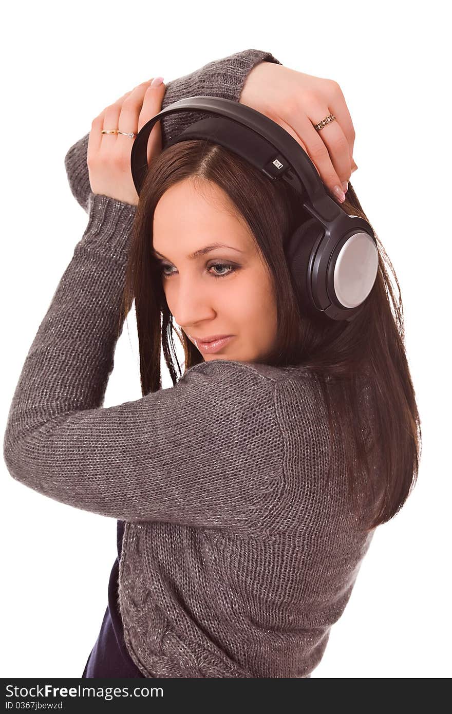 Photo of dancing woman with headphones on isolated background