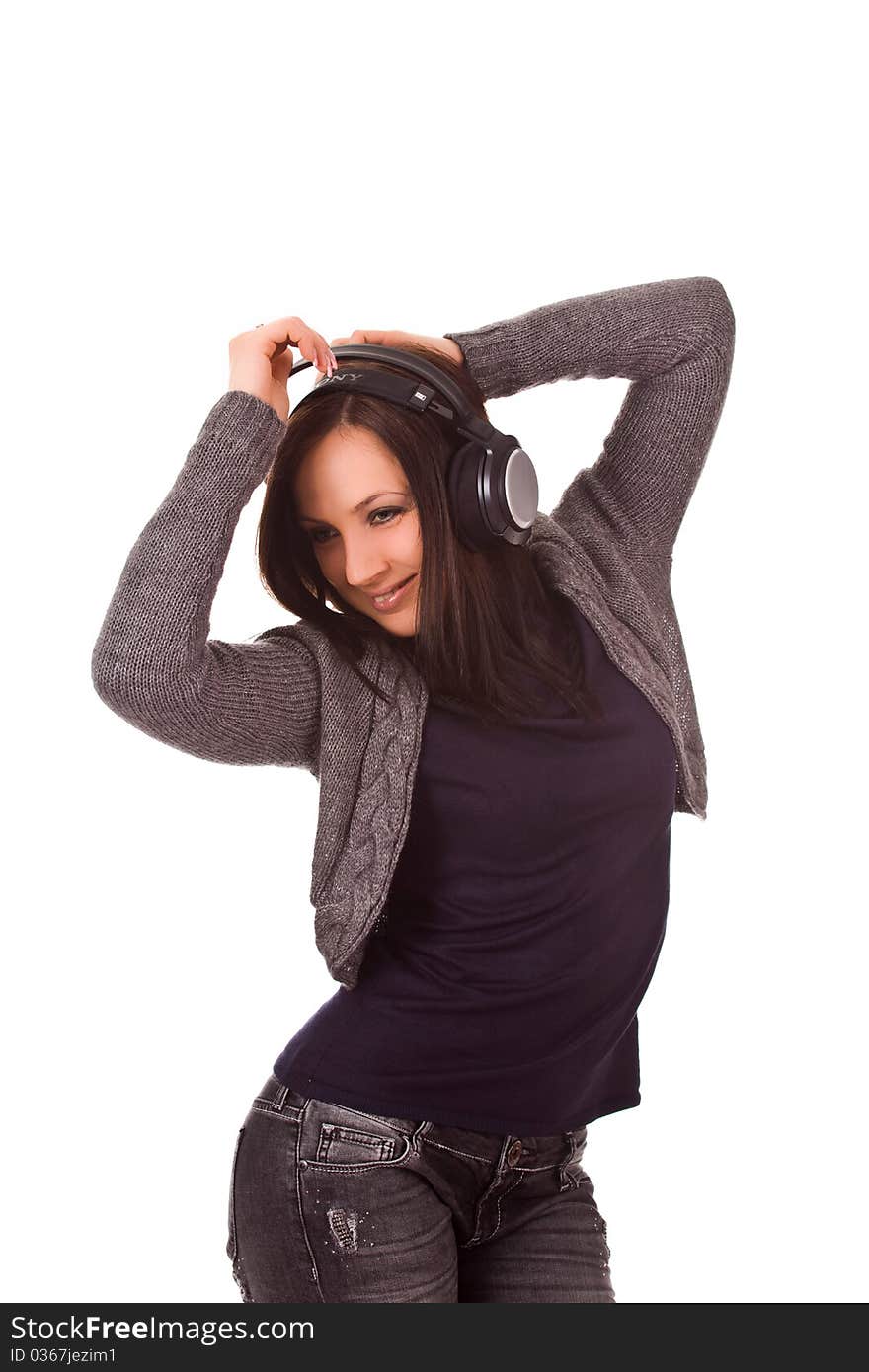 Photo of dancing woman with headphones on isolated background