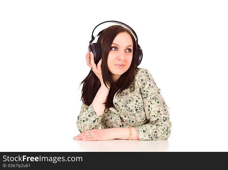 Photo of cute woman with headphones is listening to musc