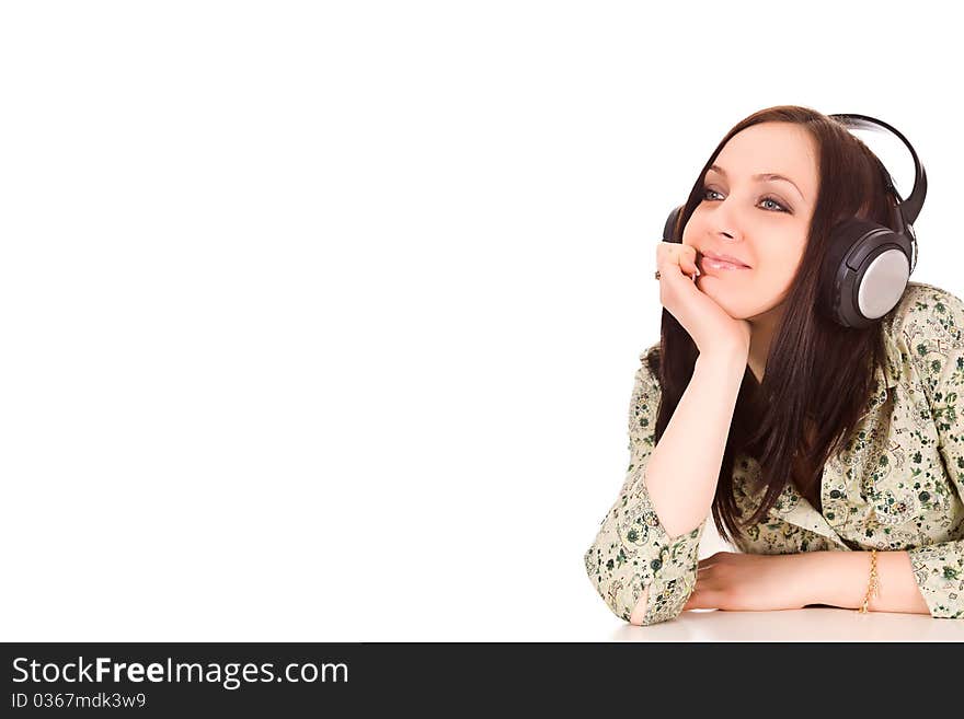 Photo of cute woman with headphones is listening to musc