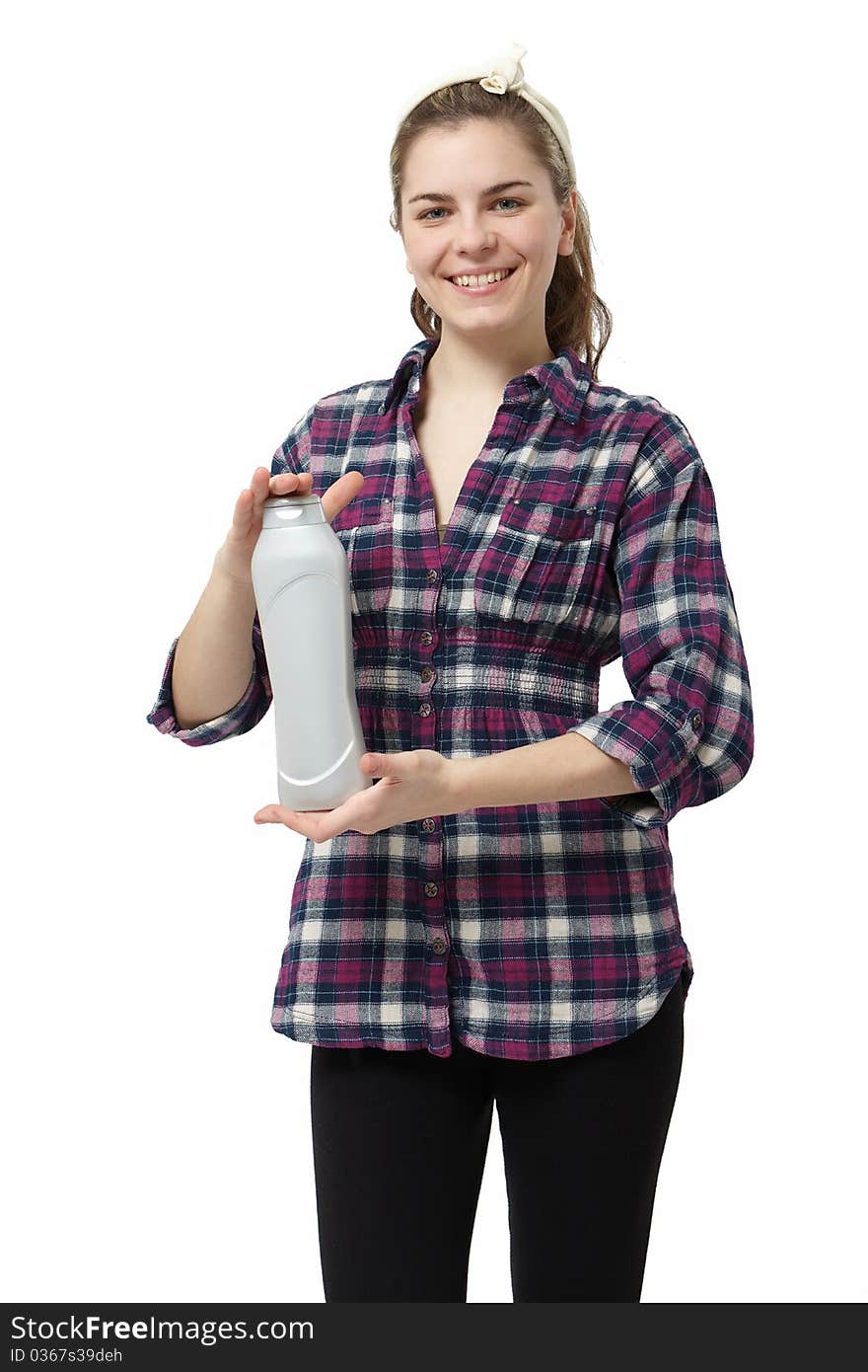 Young woman with a gray detrgent bottle isolated on white. Young woman with a gray detrgent bottle isolated on white