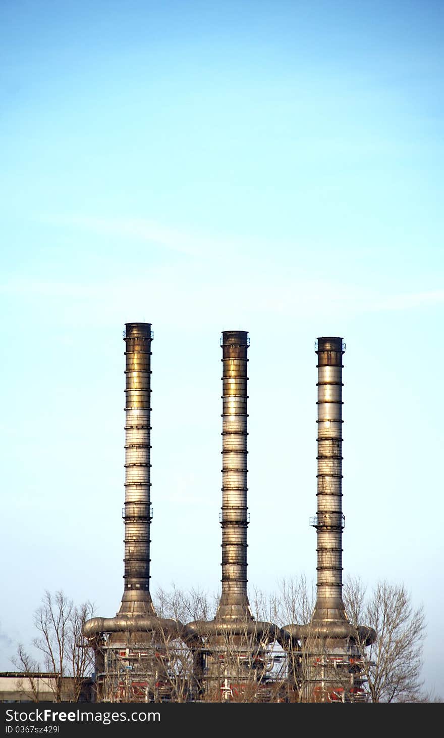 Image of a heating station chimneys near the river