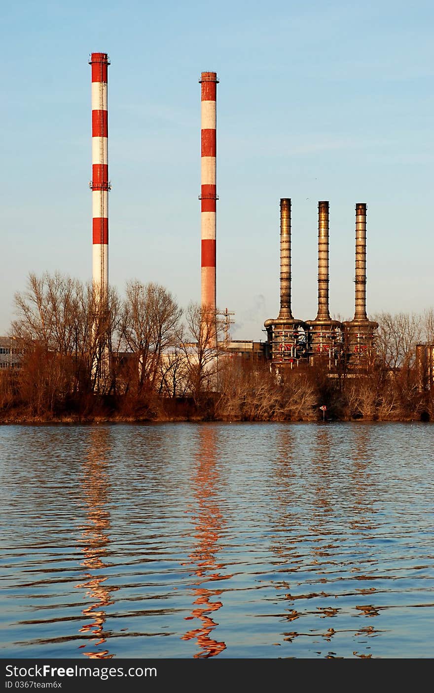 Heating station chimneys near the river