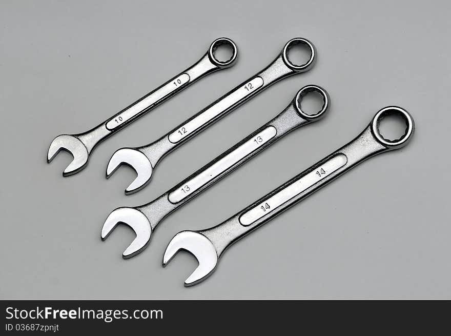 A set of spanners isolated on a light background