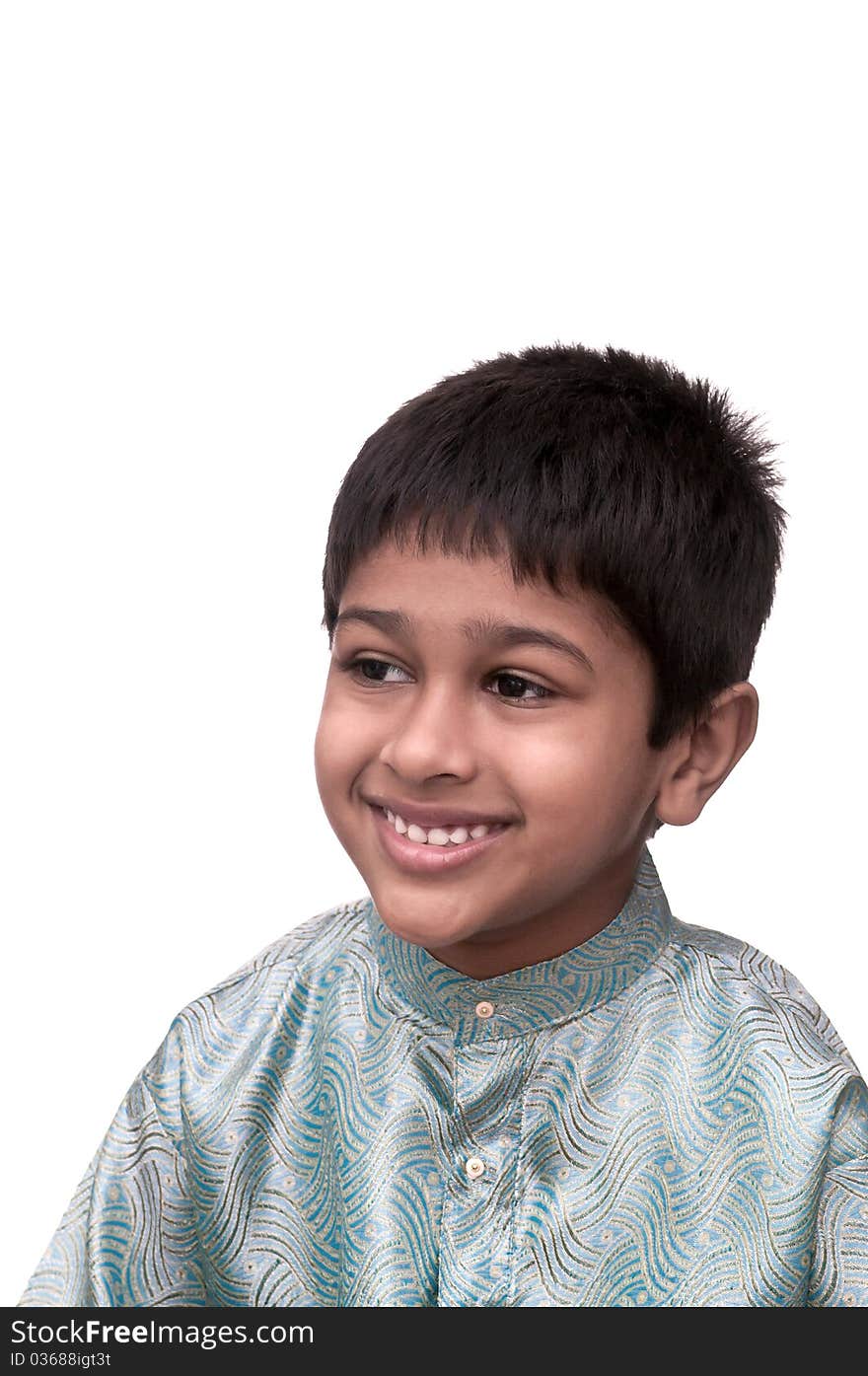 An handsome indian kid smiling for you