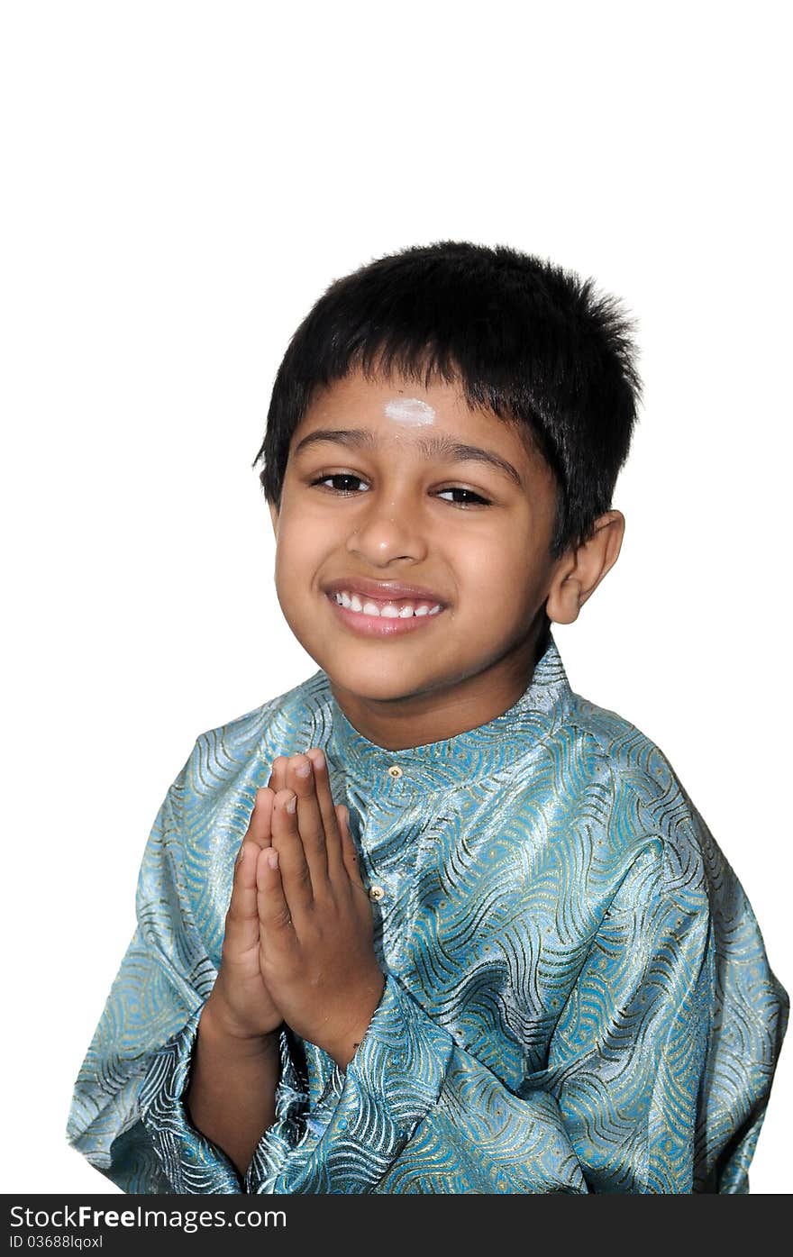 An handsome indian kid smiling for you