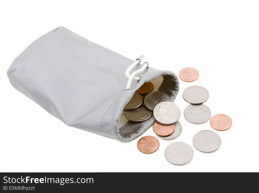 The various American coins combined in a bag (isolated, focus on foreground coins)