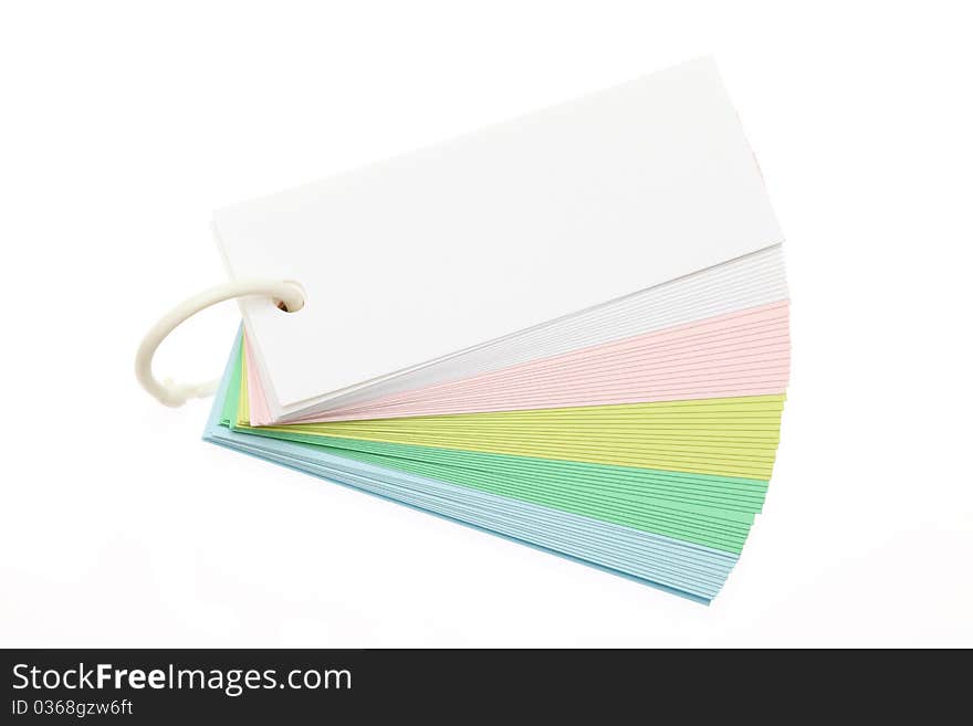 Paper and ring on a white background