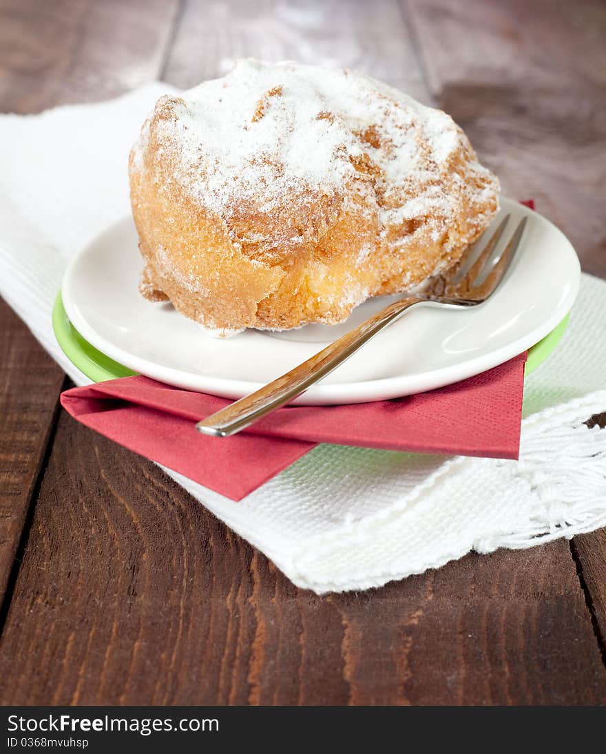 Cream puff on a plate