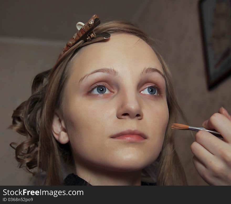 Which portrait of the woman do a make-up