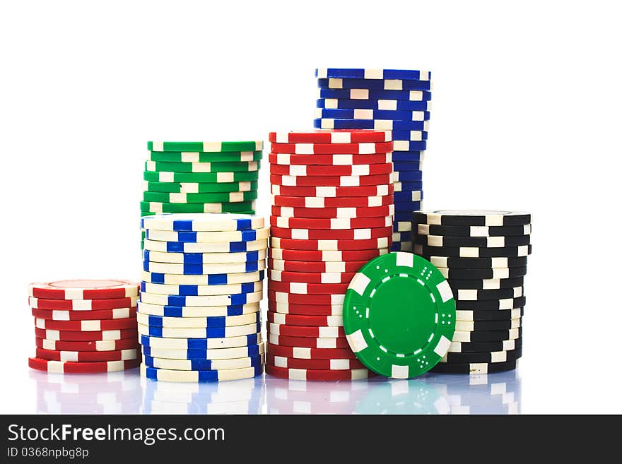 Stacks of poker chips on a white background