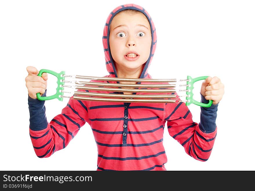 Schoolgirl With Expander In The Hands