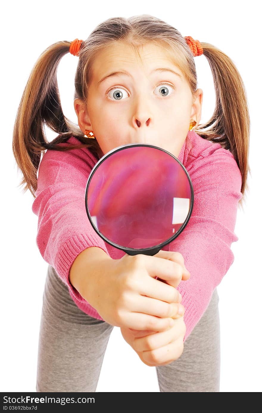 Interesting girl on a white background with a magnifying glass in hand. Interesting girl on a white background with a magnifying glass in hand