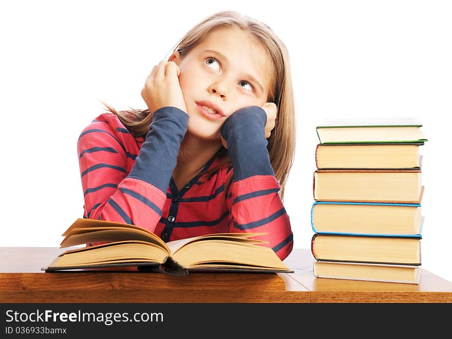 Portrait of a beautiful schoolgirl reading a book on white background