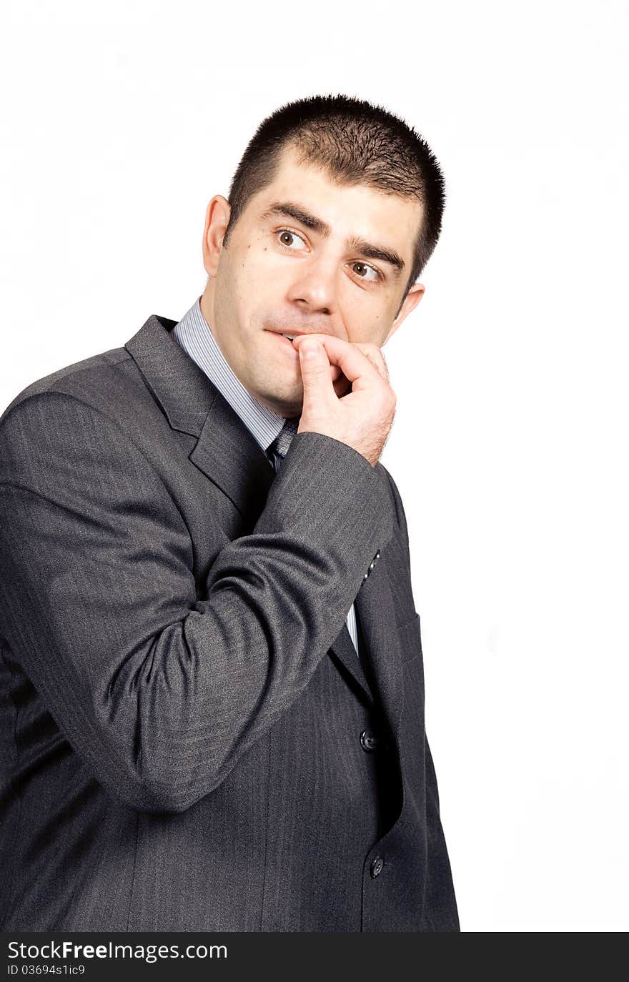 Worried businessman against white background