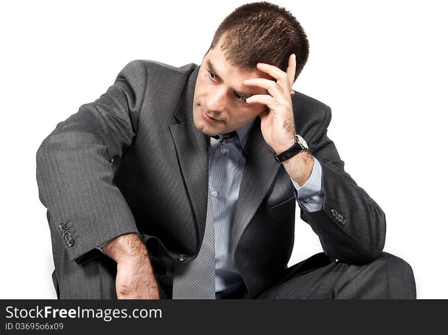 Worried businessman against white background