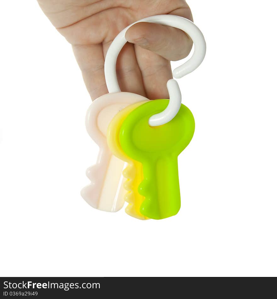 Hand is holding toy keys