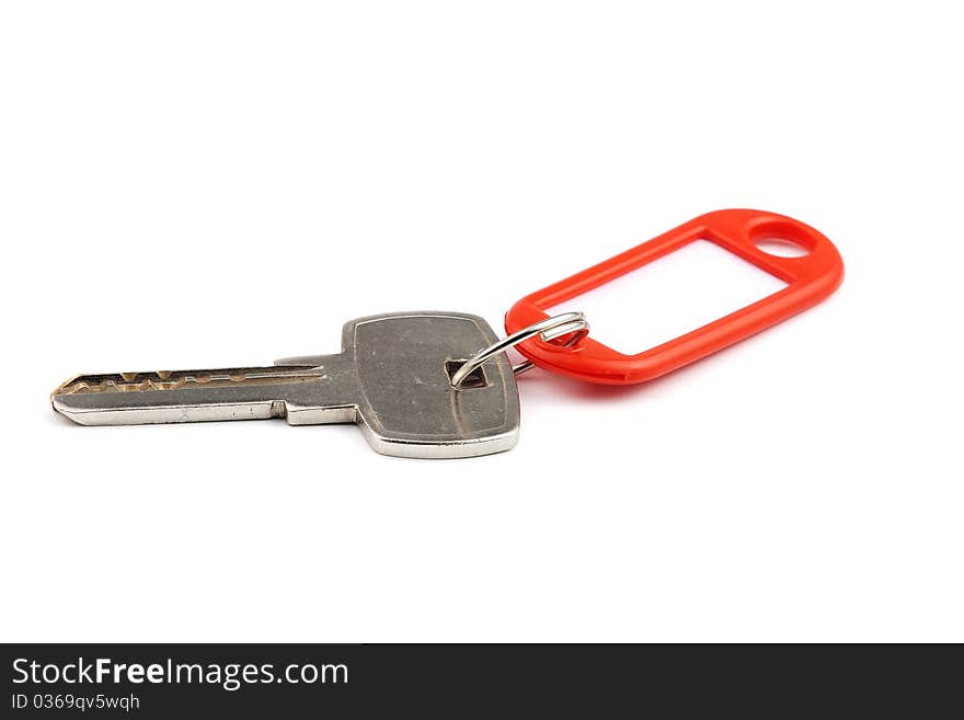 Key with red nameplate isolated over white