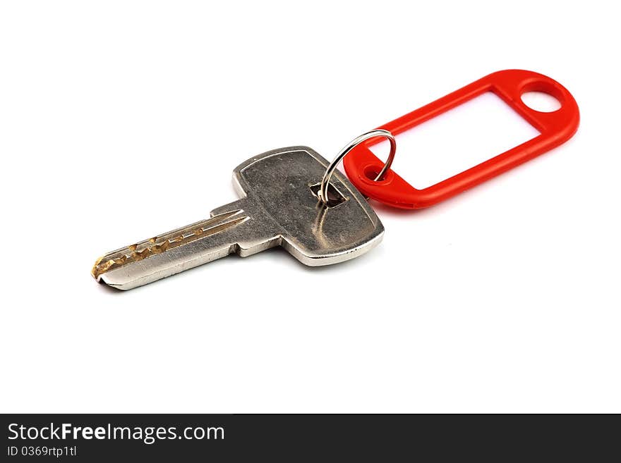 Key with red nameplate isolated over white