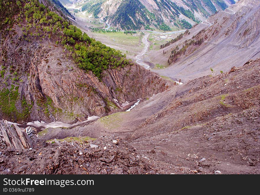 A beautiful scene with pink and red colored mountains amd small pathways. A beautiful scene with pink and red colored mountains amd small pathways.